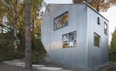 Corrugated steel-clad villas