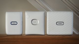 The Instax Mini Link, Instax Square Link and Instax Link Wide printers side by side by side