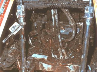Damage to the Apollo 1 command module is shown here after a fire broke out in the spacecraft during a routine pad test in January 1967, killing three astronauts inside.