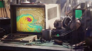 Arc Raiders Weather Monitor: A close-up of a computer monitoring a storm.
