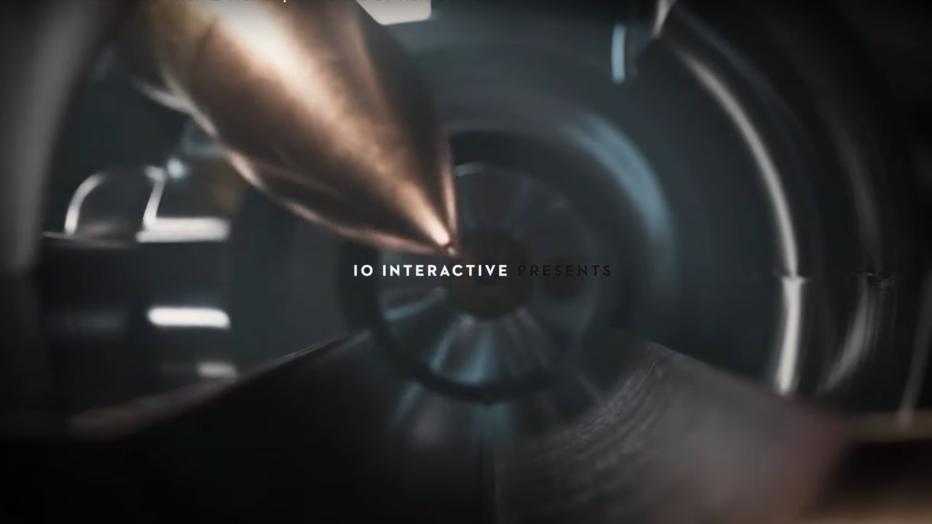 A screenshot of a bullet going into a gun chamber during the trailer for Project 007 for the Switch 2.