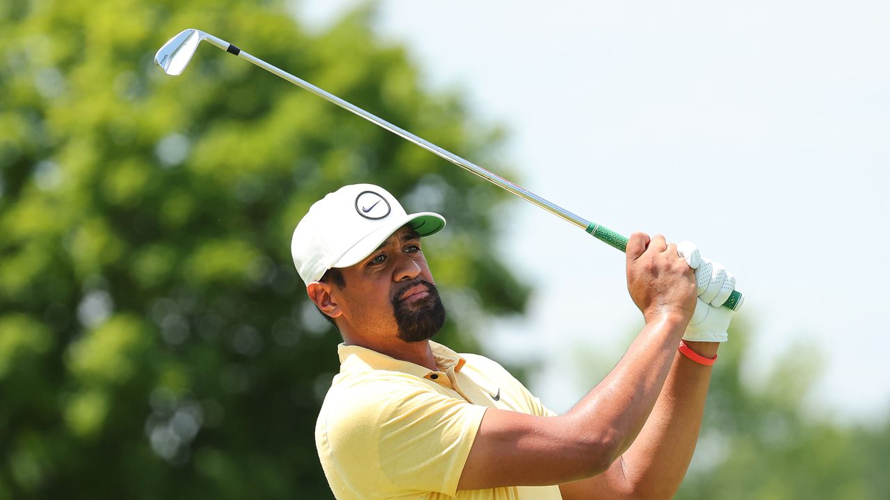 Photo of tony finau hitting an iron shot