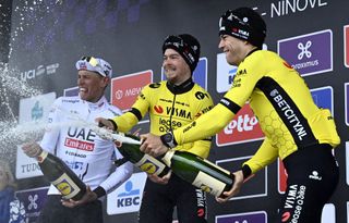 German Nils Politt of UAE Team Emirates, Slovenian Jan Tratnik of Team Visma-Lease a Bike and Belgian Wout van Aert of Team Visma-Lease a Bike celebrate on the podium of the 79th edition of the men's one-day cycling race Omloop Het Nieuwsblad (UCI World Tour), 202km from Gent to Ninove, Saturday 24 February 2024.
BELGA PHOTO DIRK WAEM (Photo by DIRK WAEM / BELGA MAG / Belga via AFP)