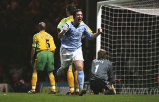 Robbie Fowler of Manchester City celebrates his winning goal during the Barclays Premiership match between Norwich City and Manchester City at Carrow Road on February 28, 2005 in Norwich, England.