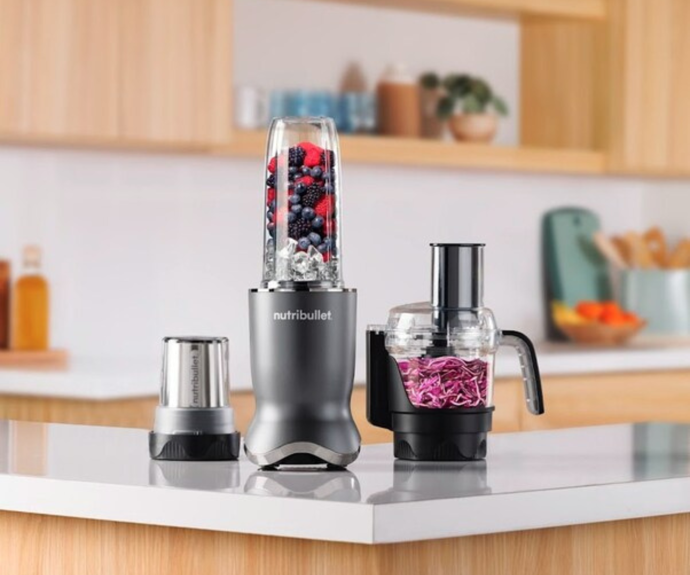 Nutribullet Ultra Plus and attachments on a modern kitchen island
