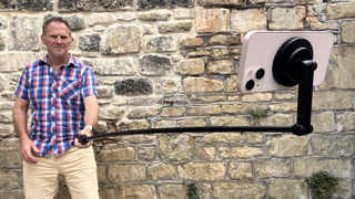 Man holding KraftGeek JustTap Magnetic Phone Tripod as a Selfie Stick