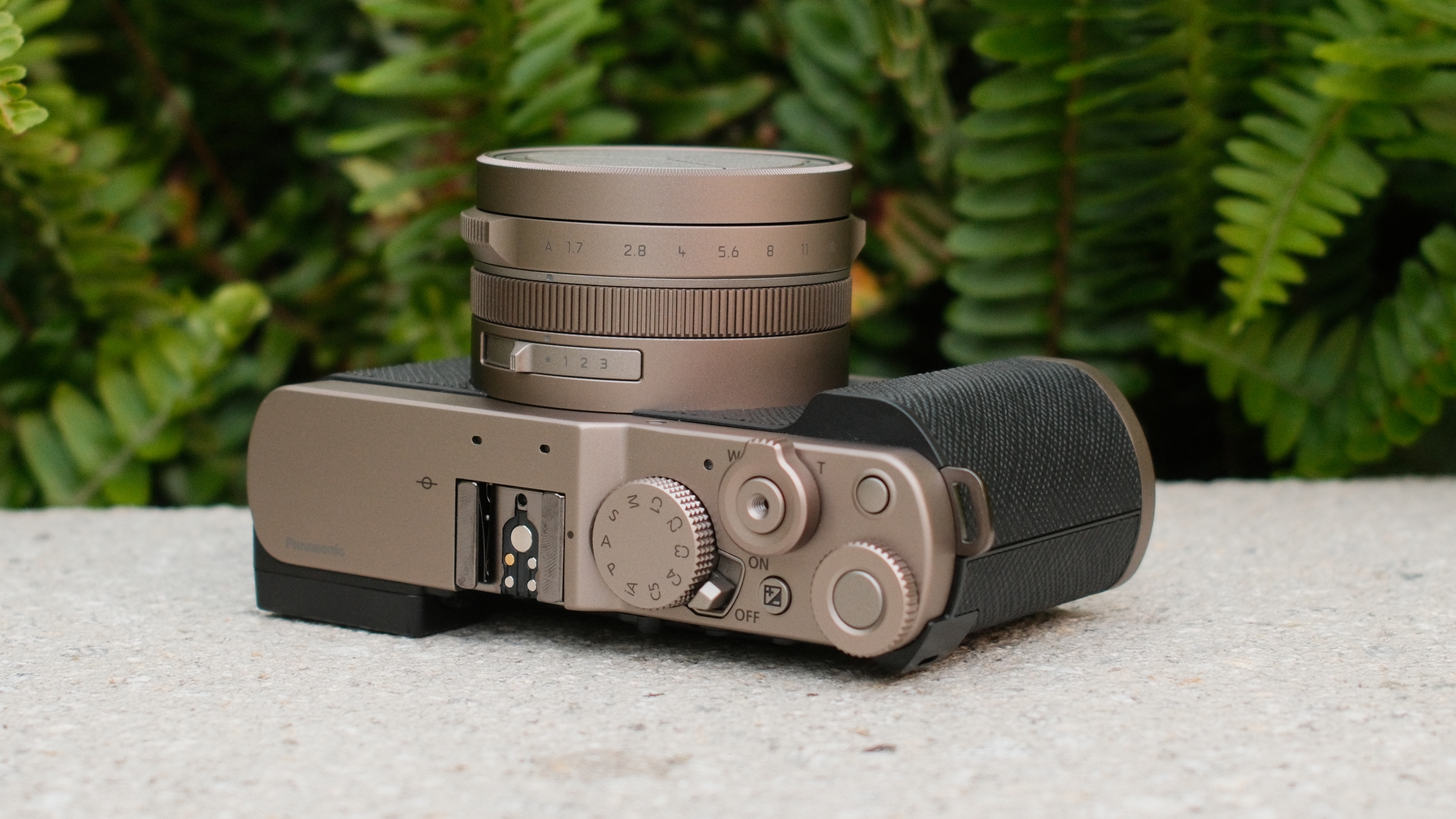 Panasonic Lumix L10 camera with lens cap on, shown from the top.