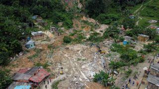 An aerial photo of a landslide on a hillside in Brazil