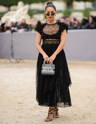 Paris Fashion Week guest in black lace outfit