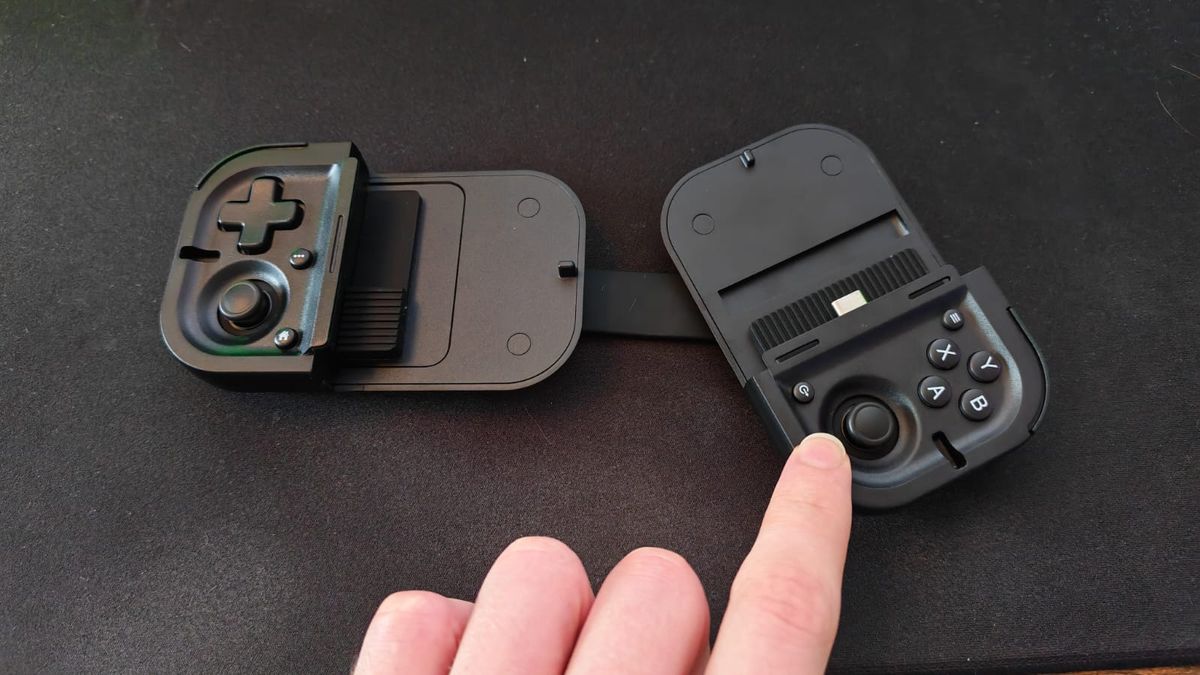 A reviewer rotating the right hand side of the Razer Prio