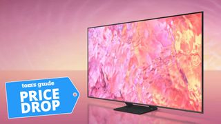 Samsung QLED Q60C TV screen with pink display and pink background with Toms Guide price drop deal badge in left bottom corner