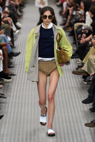 A model walking the runway at Miu Miu's Spring/Summer 2025 Paris Fashion Week show.