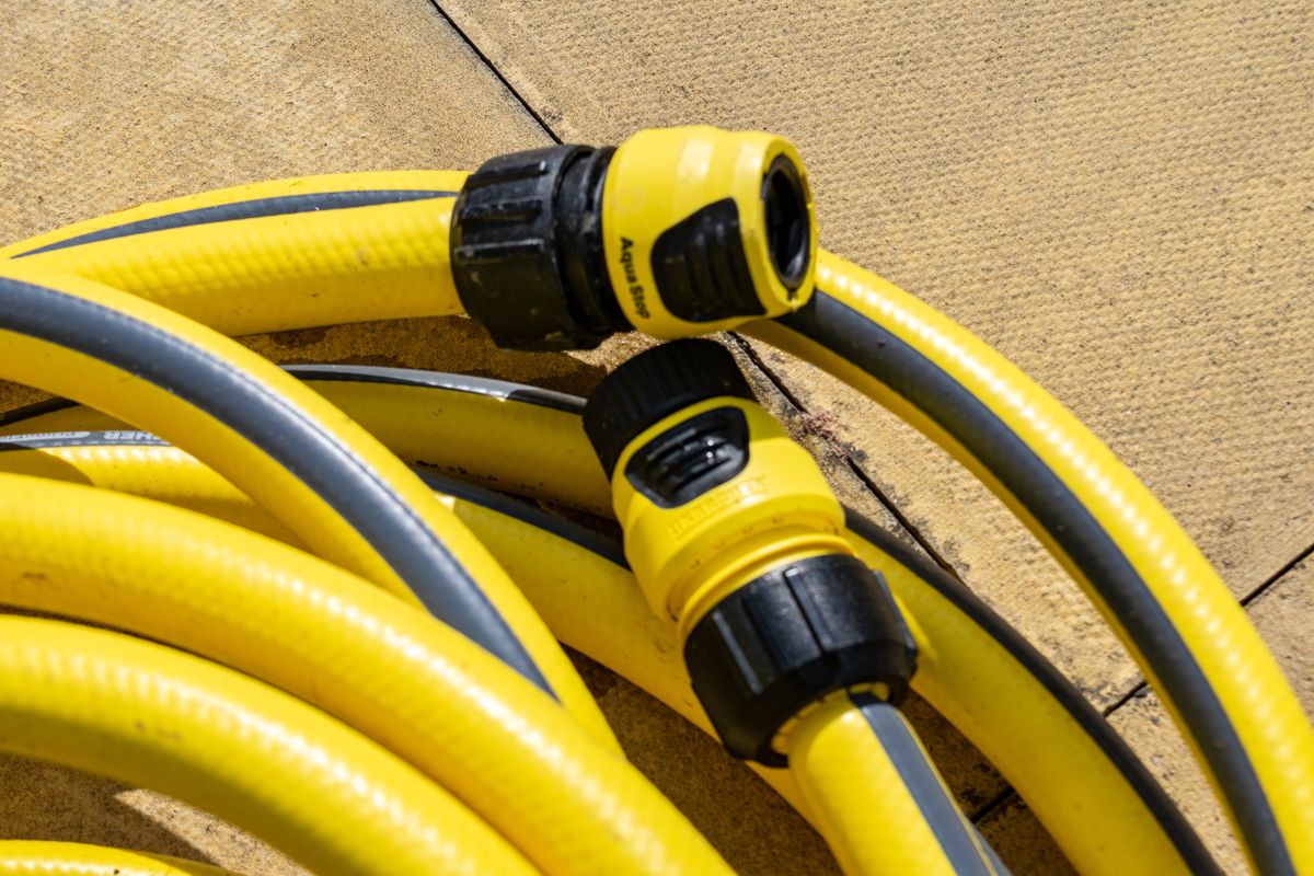 A yellow Karcher K2 Pressure washer hose