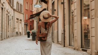 woman walking streets in italy