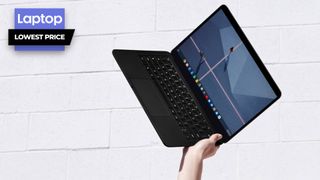 Google Pixelbook Go laptop in black with white brick wall background