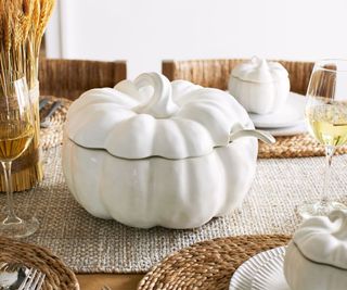 Pumpkin Stoneware Tureen on a dining table.