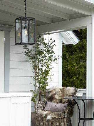 statement pendant light in outdoor porch