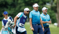 Majesticks GC's Ian Poulter and Lee Westwood walk off the fairway