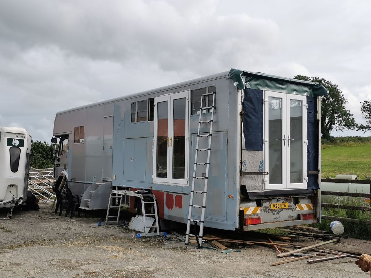 The caravan during construction shows the walls being stripped down