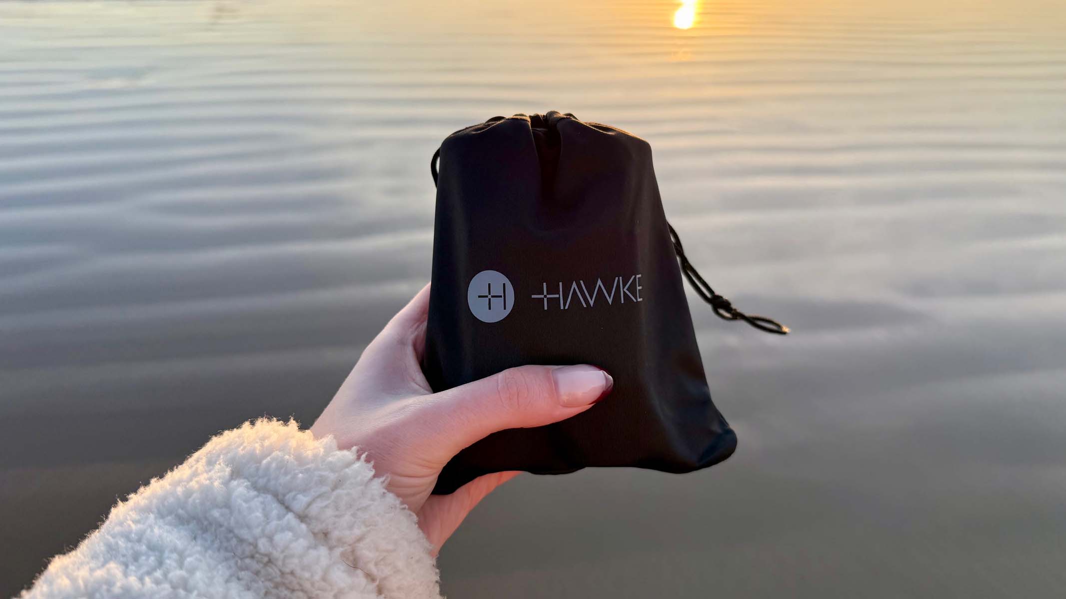 Hawke Endurance ED 8x25 in the hand at a coastal location