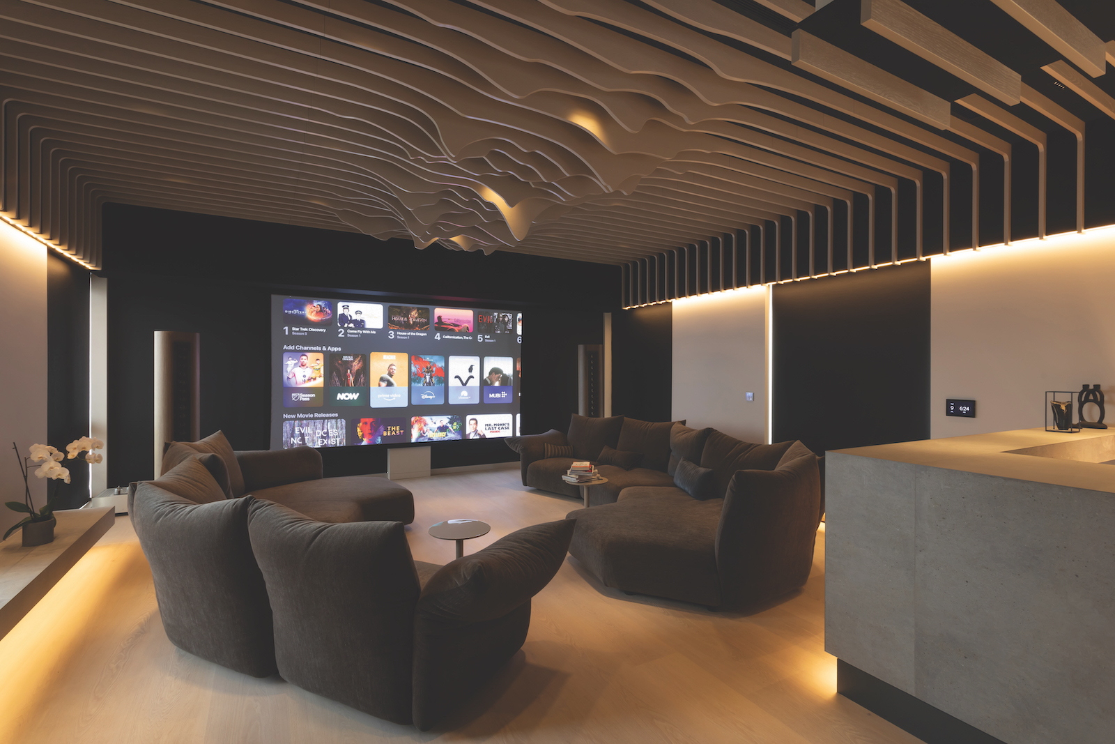 A photograph of a custom install home cinema and hi-fi system in a London penthouse apartment