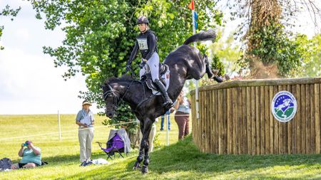 Caroline Pamukcu and HSH Blake seal their selection for the US squad at the 2026 eventing World Championships with second in the five-star at Kentucky &ndash;&nbsp;they are pictured dropping down a big step on the cross-country.