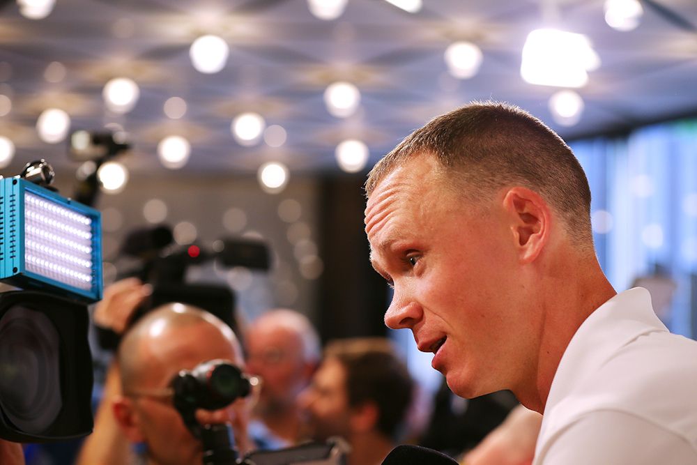 Chris Froome talks with members of the media at Team Sky's pre-Tour press conference