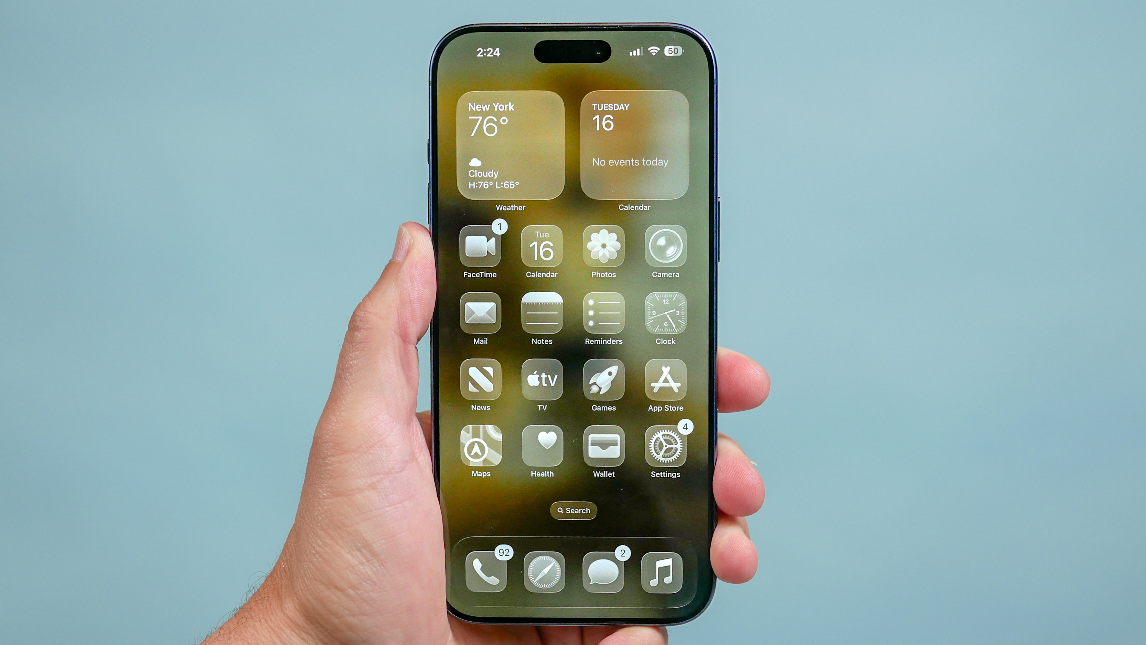 iPhone 17 Pro Max Liquid Glass interface.