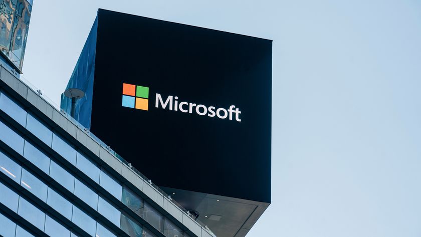 Logo of Microsoft, developer of the Remote Desktop app, pictured on a billboard on top of a building.