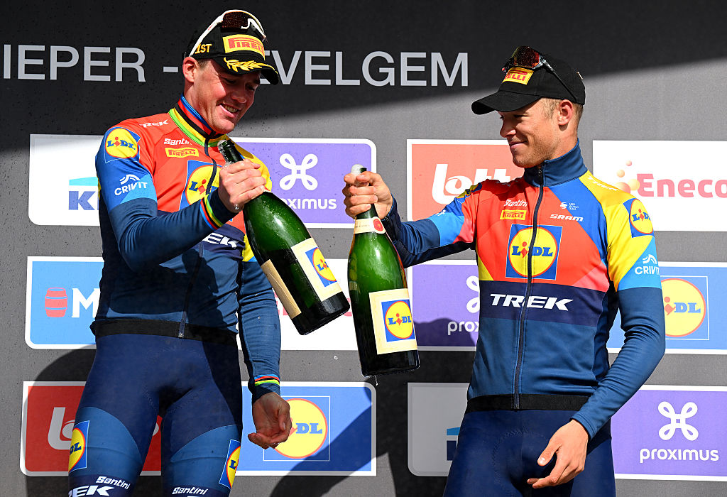 WEVELGEM, BELGIUM - MARCH 30: (L-R) Race winner Mads Pedersen of Denmark and Team Lidl - Trek and Jonathan Milan of Italy and Team Lidl - Trek on third place pose on the podium ceremony after the 87th Gent-Wevelgem in Flanders Fields 2025, Men's Elite a 250.3km one day race from Ypres to Wevelgem / #UCIWT / on March 30, 2025 in Wevelgem, Belgium. (Photo by Tim de Waele/Getty Images)