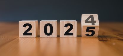 wooden blocks showing a change from 2024 to 2025