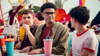 Charlie with his friends at the fair in Heartstopper season 3