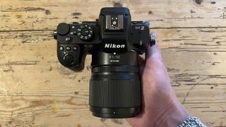 Nikon Z50 II mirrorless camera on a wooden tabletop