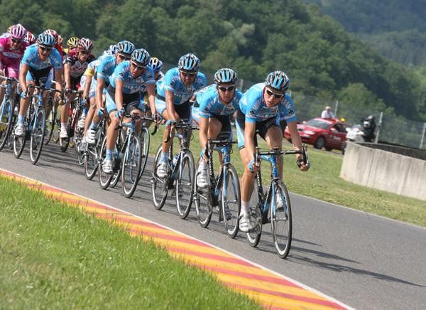 Milram strings out the peloton.