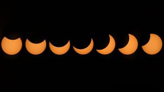 A partial solar eclipse gives the sun a crescent shape, or makes it appear as if a "bite" has been taken out of the sun. 