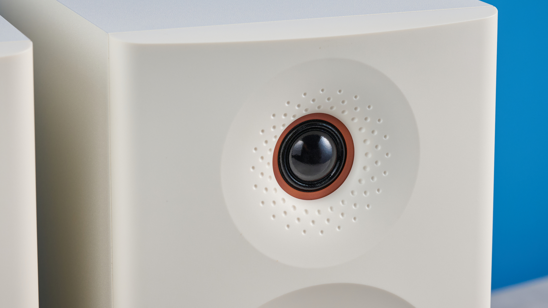the Edifier MR5 studio monitors bookshelf speakers photographed with the blue tom's guide background