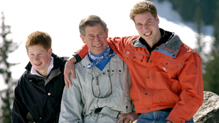 Prince Charles Smiling With His Teenage Sons Prince William And Prince Harry At The Start Of Their Annual Skiing Holidays in 2002