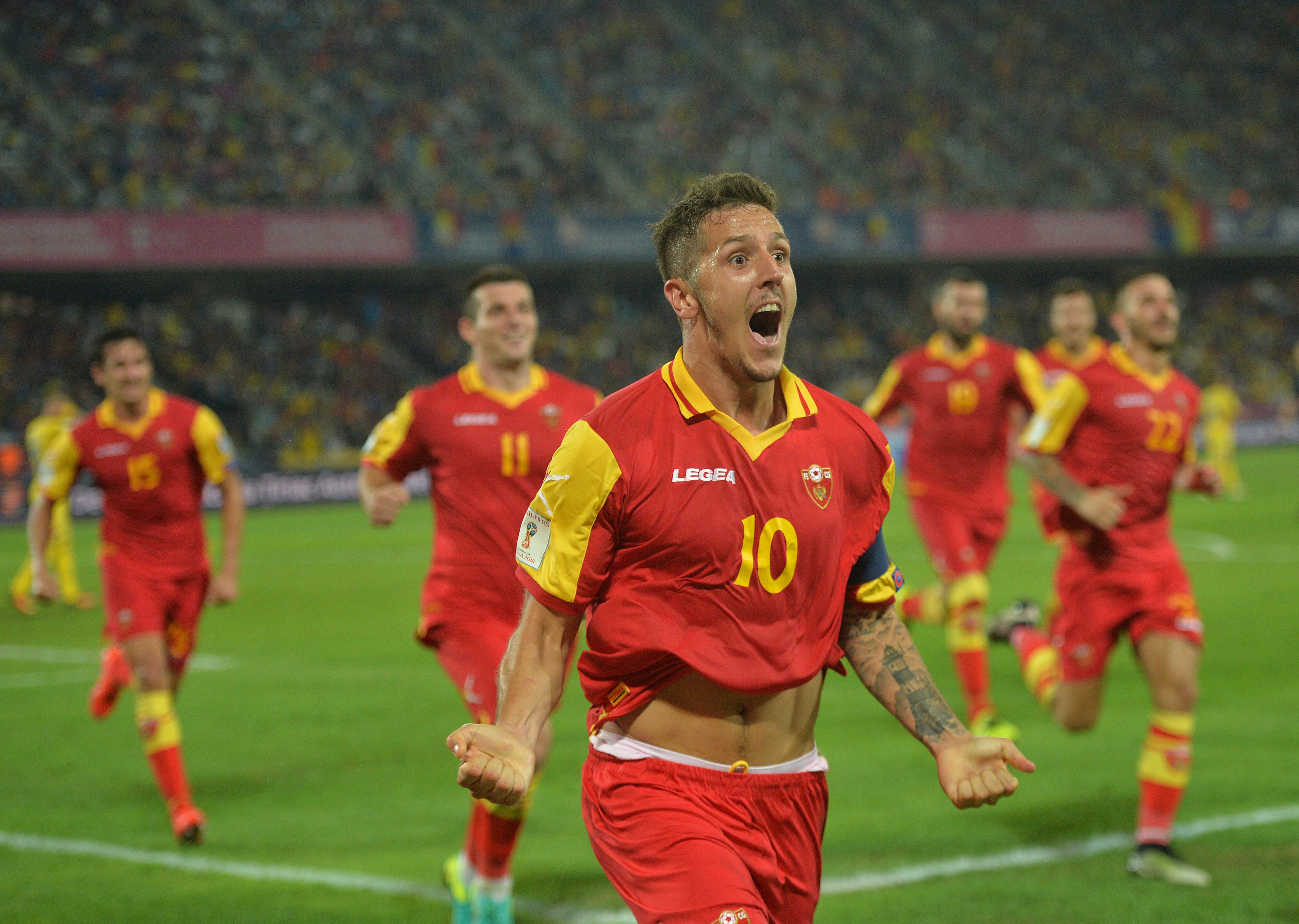 Stevan Jovetic celebrates after scoring for Montenegro against Romania in 2015.
