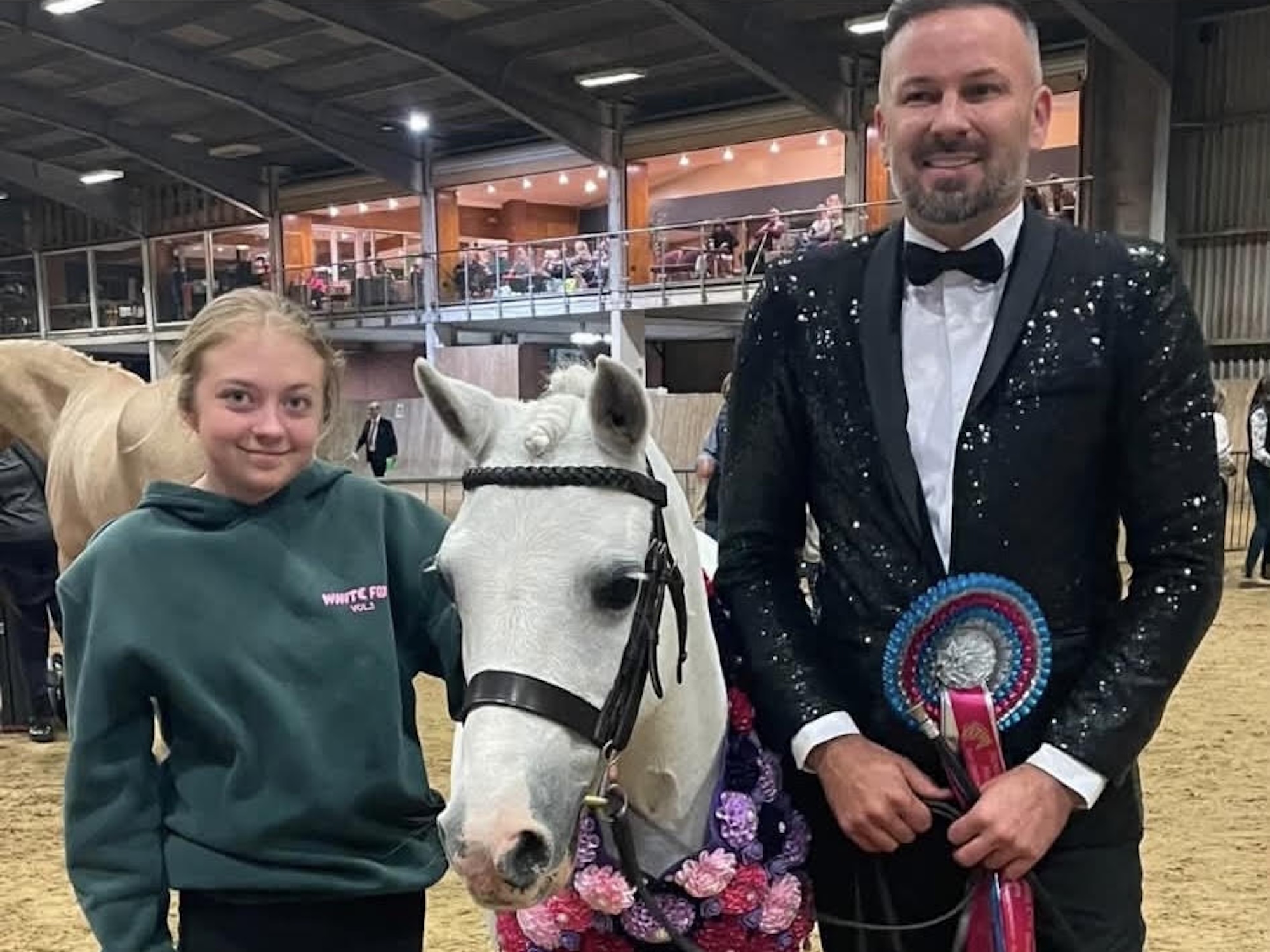 Millie Rackham, Overley Gamebird and Justin Hollis stand facing the camera for a photo.