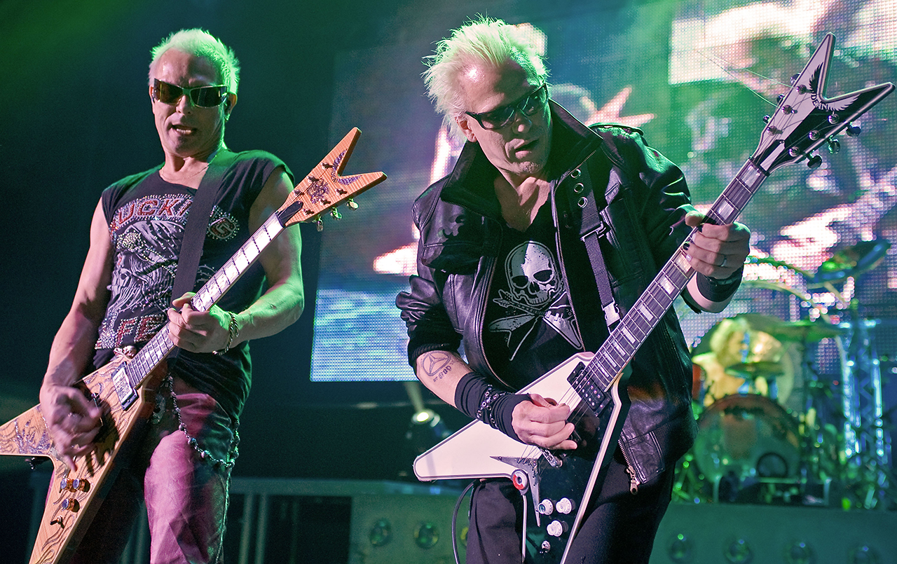 Rudolf (left) and Michael Schenker performing on stage with the Scorpions