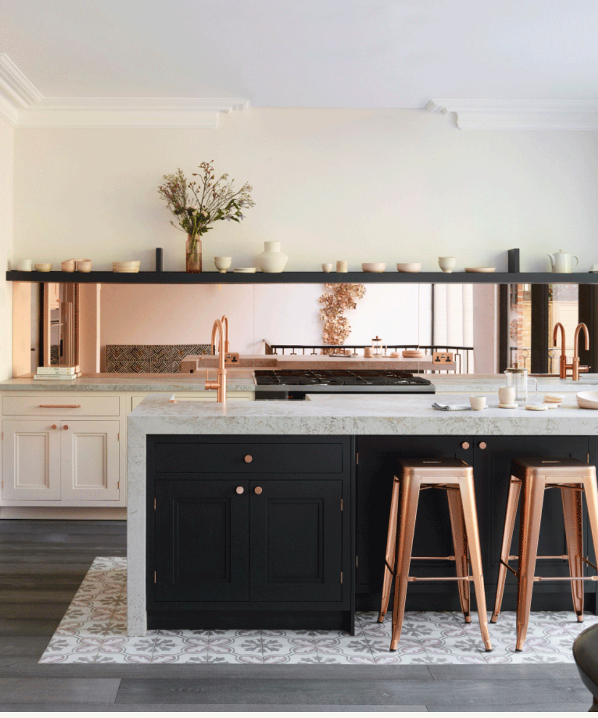 Kitchen with copper mirrored splashback