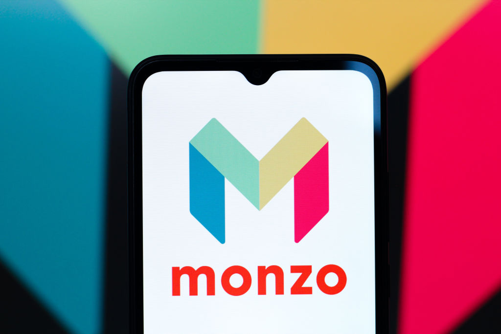  In this photo illustration, the Monzo Bank logo is seen displayed on a smartphone screen