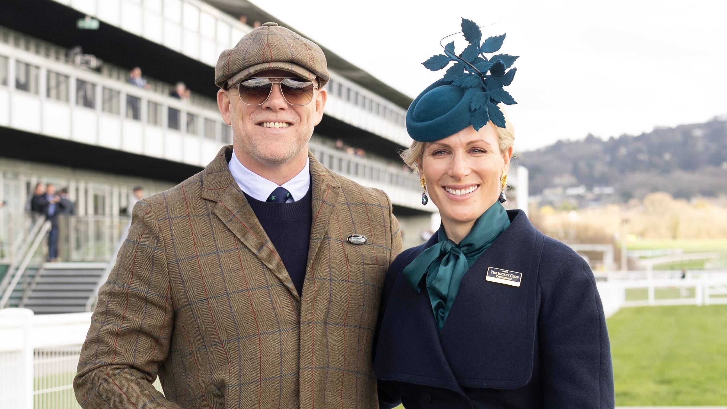 Mike and Zara Tindall smile as they attend Day 1 of Cheltenham 2026