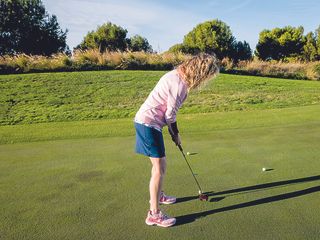 Golf Monthly Top 50 Coach Katie Dawkins demonstrating the four points of a compass putting game