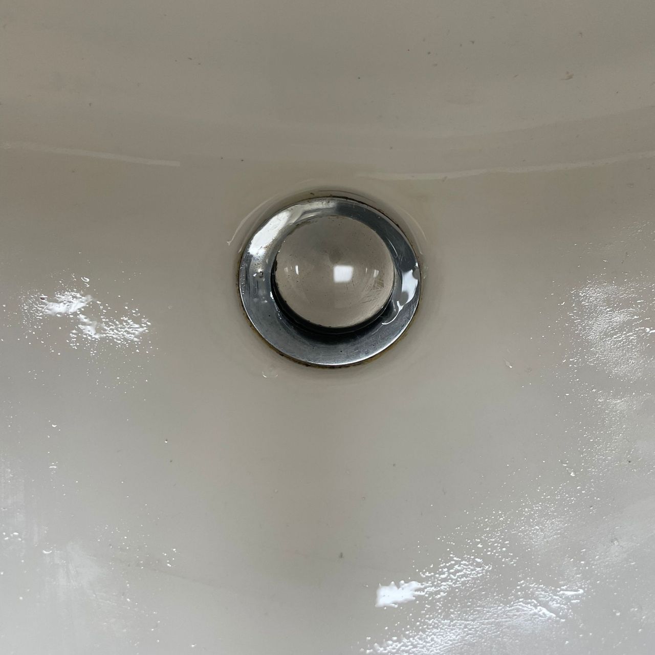 Clean sink and plughole after being steam cleaned