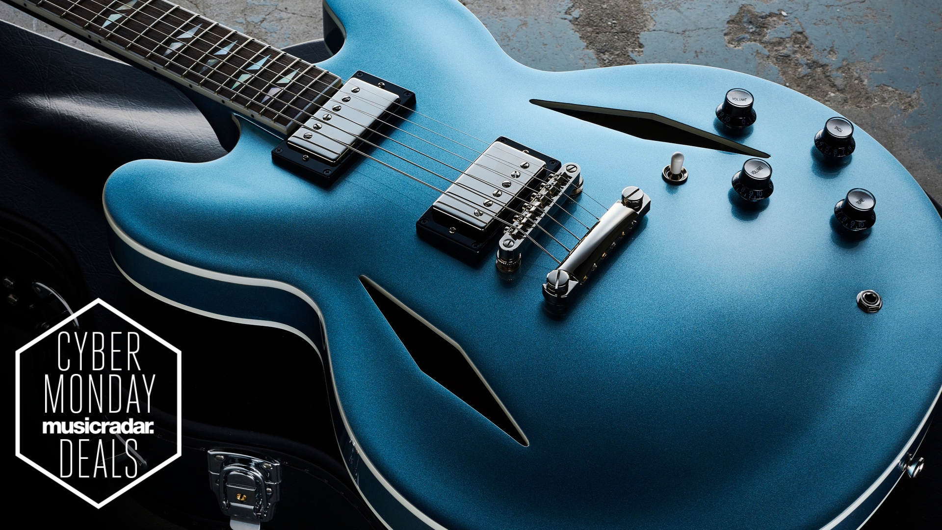 An Epiphone Dave Gorhl DG-335 semi-hollow guitar lying on a guitar case