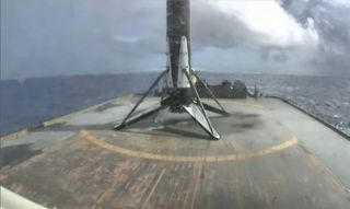 The first stage of a veteran SpaceX Falcon 9 rocket is seen on the drone ship Just Read The Instructions in the Atlantic Ocean after successfully launching the Sirius XM satellite SXM-7 into orbit on Dec. 13, 2020.