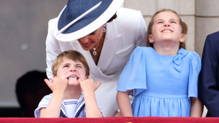Prince Louis of Cambridge. pulls a face as he watches the RAF flypast with Catherine, Duchess of Cambridge and Princess Charlotte of Cambridge from the balcony of Buckingham Palace during the Trooping the Colour parade on June 02, 2022 in London, England