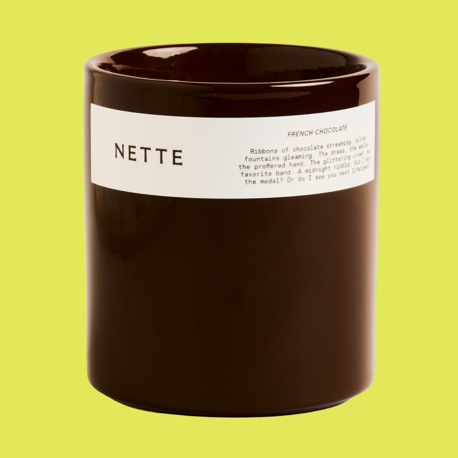A French chocolate-scented candle in a glossy brown vessel
