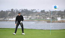 Rory McIlroy walks off the green at Pebble Beach